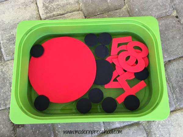 preschool ladybug window counting game with reusable stickers from Modern Preschool