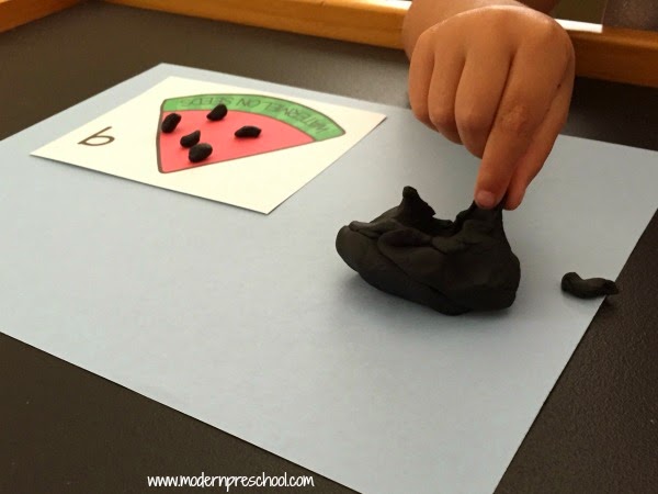 printable watermelon counting cards (1-10) to use with play dough, beads, buttons from Modern Preschool