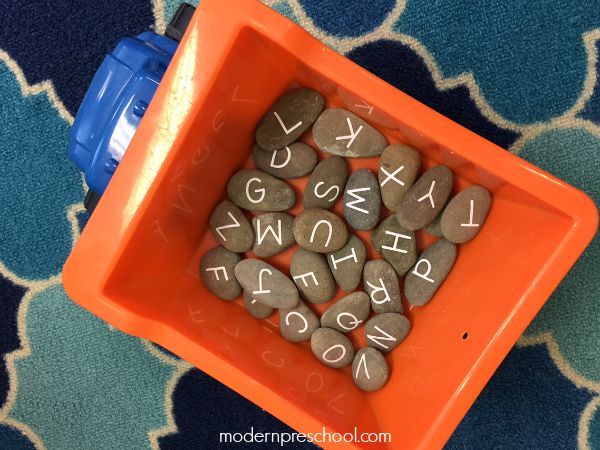 Alphabet letter learning stones for preschoolers during circle time | Modern Preschool