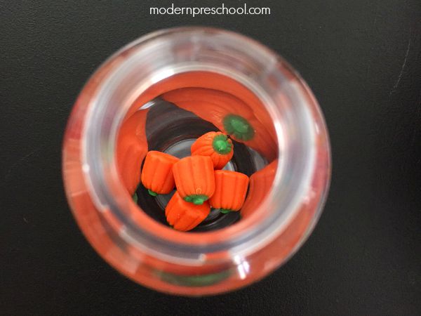 5 Little Pumpkins Sensory Bottle - perfect for circle time in preschool to go along with the fall poem :: Modern Preschool
