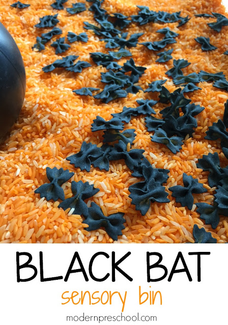 Halloween black bat fine motor sensory bin for preschoolers and toddlers from Modern Preschool!