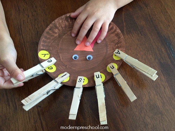Letter matching turkey feather name recognition activity & busy bag to practice letters and fine motor skills for preschoolers!