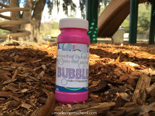 Secret Act of Kindness: Bubbles at the park for kids! Includes free printable labels from Modern Preschool.