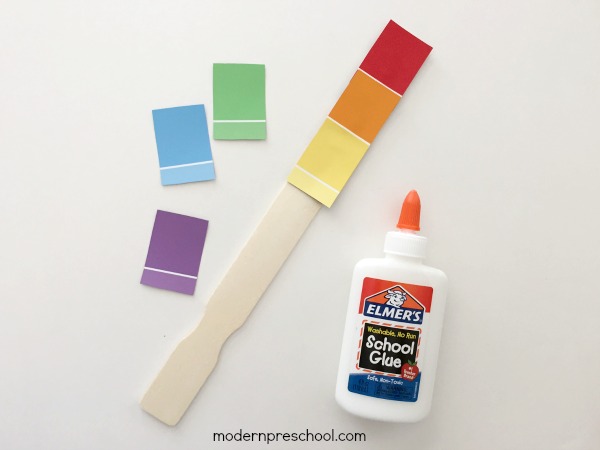 Rainbow paint chip fine motor color matching busy bag for toddlers and preschoolers. Simple activity with free supplies!