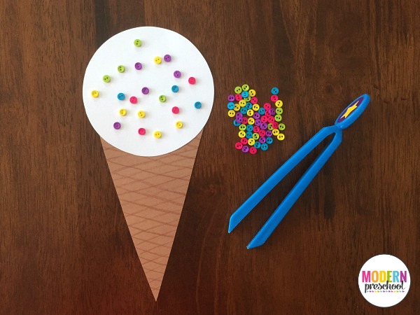 Preschoolers can strengthen fine motor skills while adding pretend sprinkles to a yummy ice cream cone treat in this super simple homemade activity!