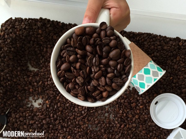 Preschoolers and toddlers will love the smell of the coffee beans during pretend play and exploration in this coffee bean sensory bin!