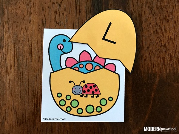FREE printable hatching dinosaur eggs initial sound match for preschoolers and kindergarteners to use during a dinosaur theme in a literacy center. Use at home as a reusable busy bag. Focus on letter sounds and beginning sounds in simple to identify pictures!