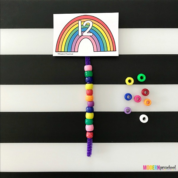 FREE printable rainbow counting beads busy bag math activity for preschoolers and kindergarteners to practice 1:1 correspondence, counting, number recognition, fine motor skills during the spring or for St. Patricks Day in your classroom or at home! Use during quiet time or morning welcome work.